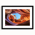 Landscape artwork of majestic canyons framed in a sleek black mat, showcasing intricate details and vibrant colors, perfect for home decor or office settings.