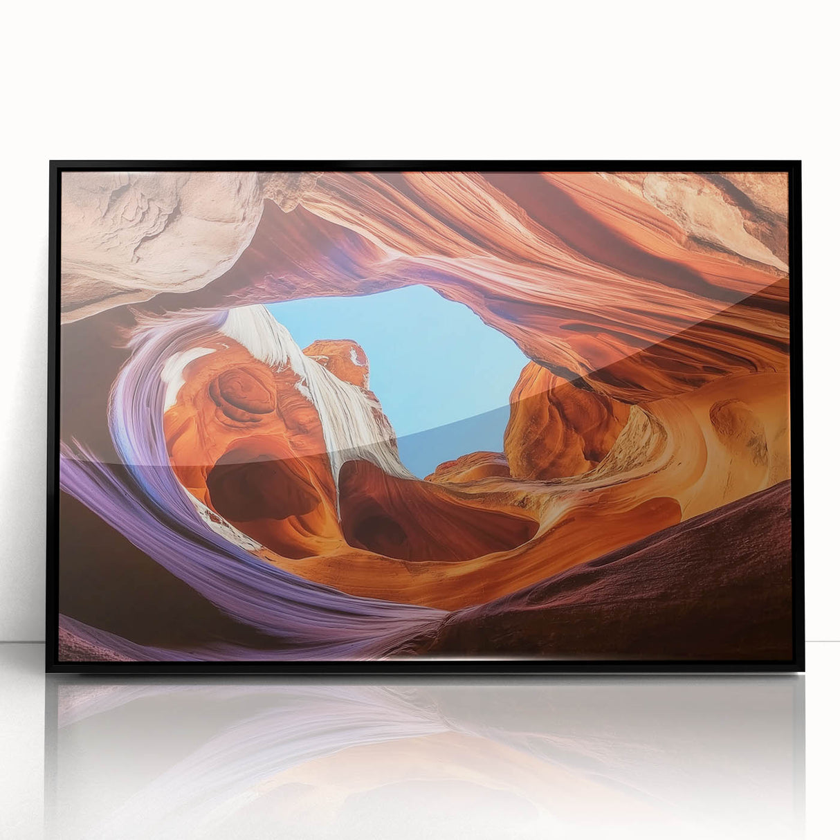 Framed acrylic artwork showcasing a stunning landscape of canyons in vibrant colors, set against a sleek black frame, ideal for home decor or office enhancement.