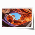 Stunning landscape print showcasing vibrant canyons with rich earth tones, rolled and packaged in a durable cardboard tube, perfect for home decor.