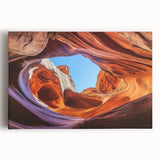 Stretched canvas artwork depicting a vibrant landscape of canyons with rich earth tones and dramatic textures, ideal for enhancing home decor with natural beauty.