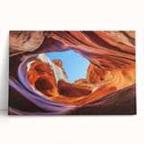 Landscape canvas print showcasing a stunning canyon scene with vibrant colors and intricate details, perfect for home decor or art enthusiasts. This stretched canvas adds a natural touch to any room, featuring rich earthy tones and dramatic rock formations.