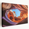 Stretched canvas artwork depicting a vibrant landscape of canyons, showcasing rich earth tones and dynamic textures, perfect for home decor or office ambiance.