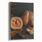 Framed canvas depicting a vintage landscape art painting with colorful autumn trees against a black background.