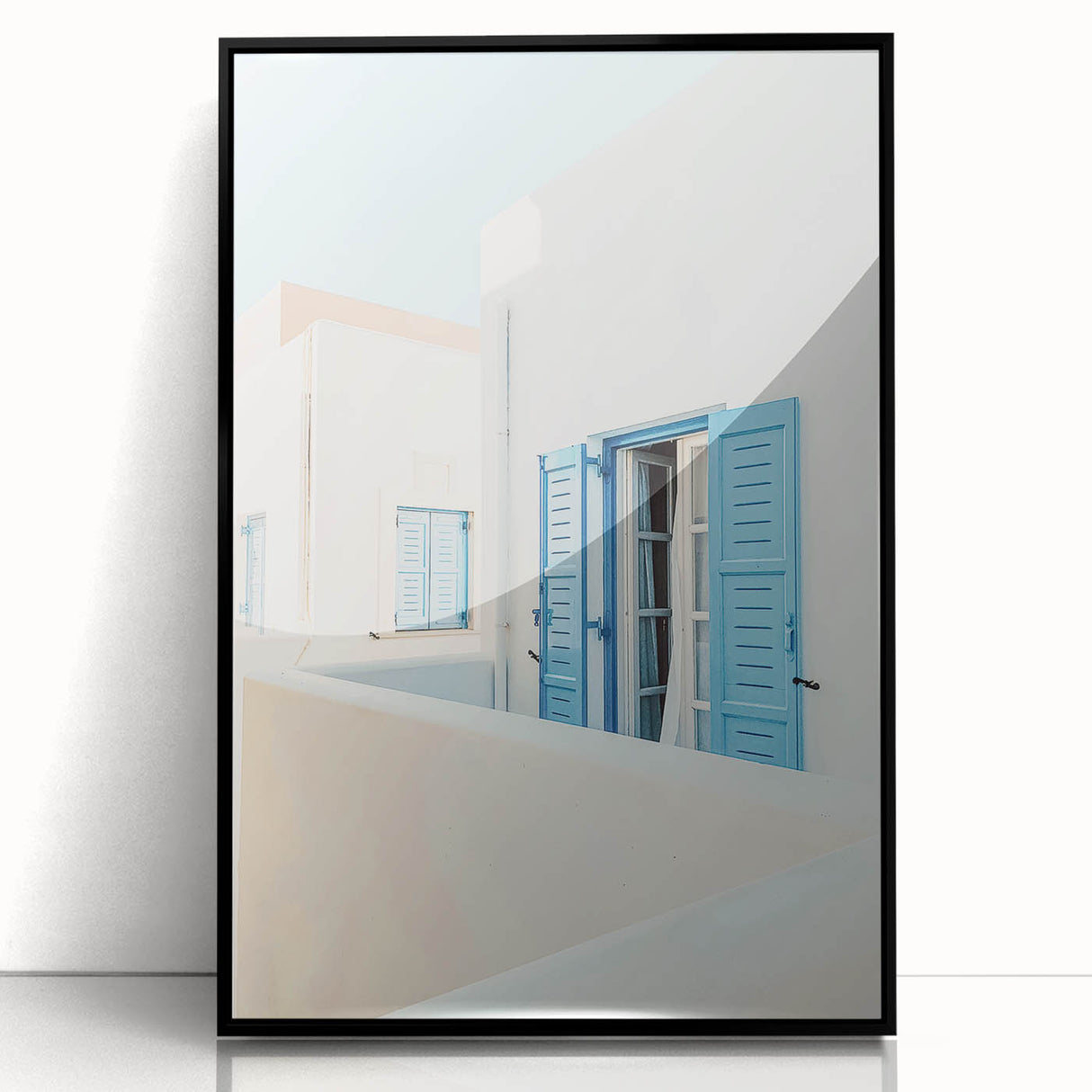 Large abstract wall art featuring mid-century modernist swirls in vibrant yellow and orange hues on black framed acrylic.