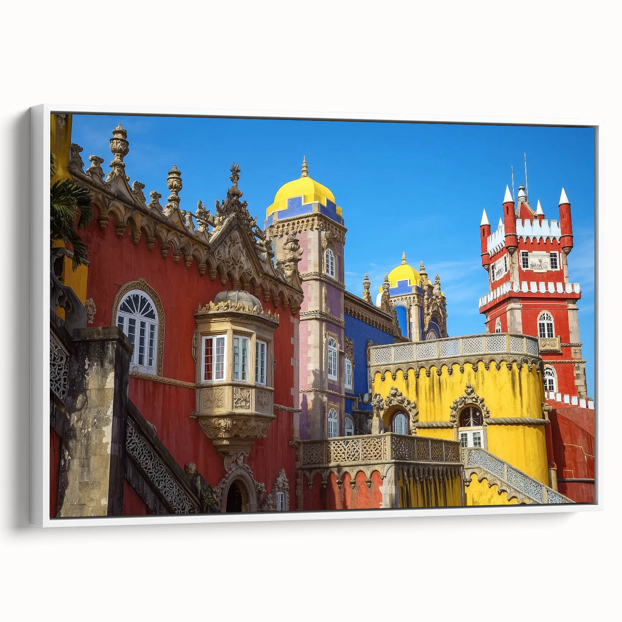 Framed canvas artwork depicting a serene landscape with a majestic castle, showcasing vibrant colors and intricate details, set against a white background.