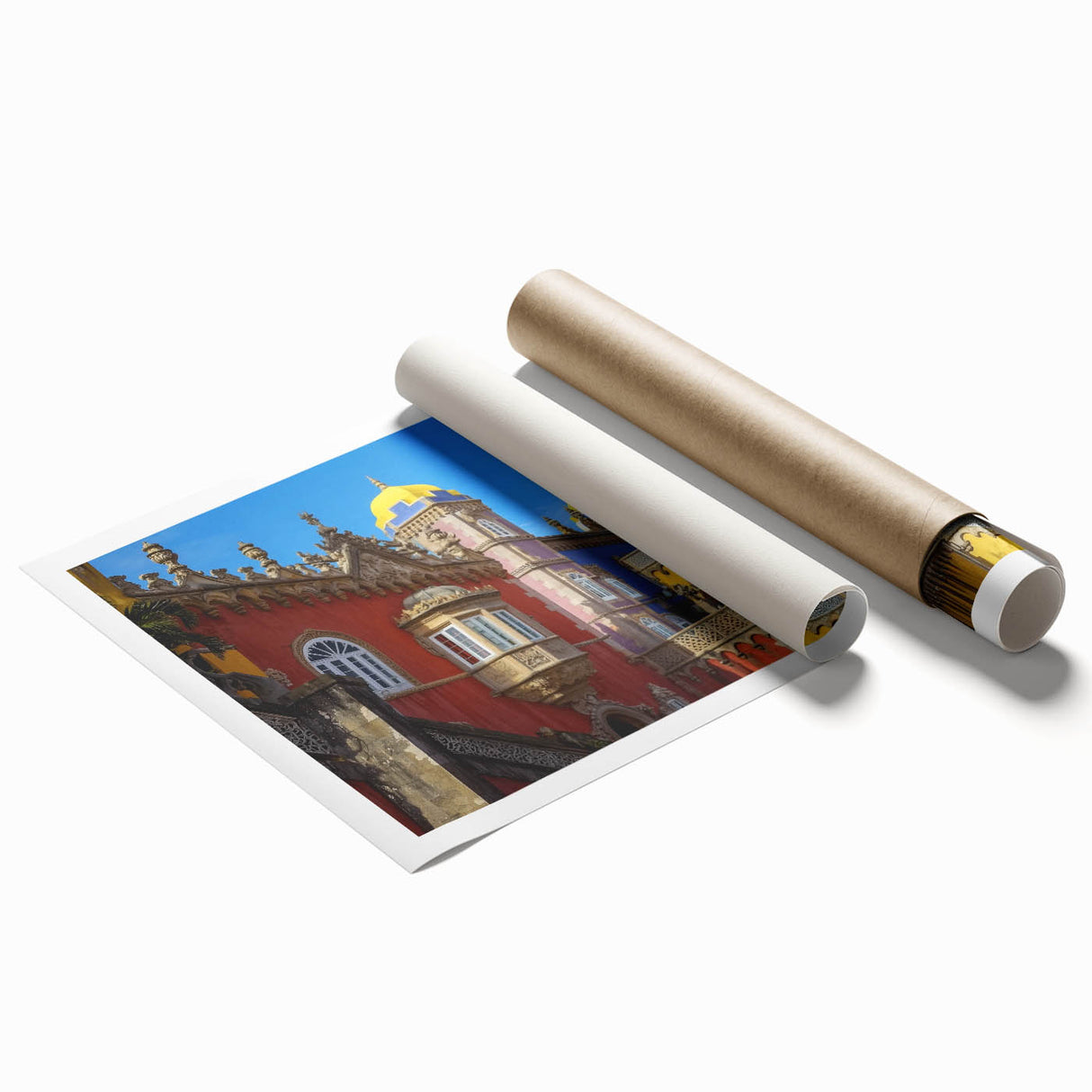 Rolled print showcasing a majestic landscape of a castle surrounded by lush greenery and a serene sky, elegantly packaged in a protective cardboard tube.