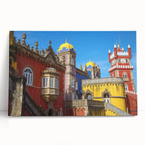 Stretched canvas artwork depicting a scenic landscape with a majestic castle surrounded by lush greenery and a clear blue sky, ideal for home decor.