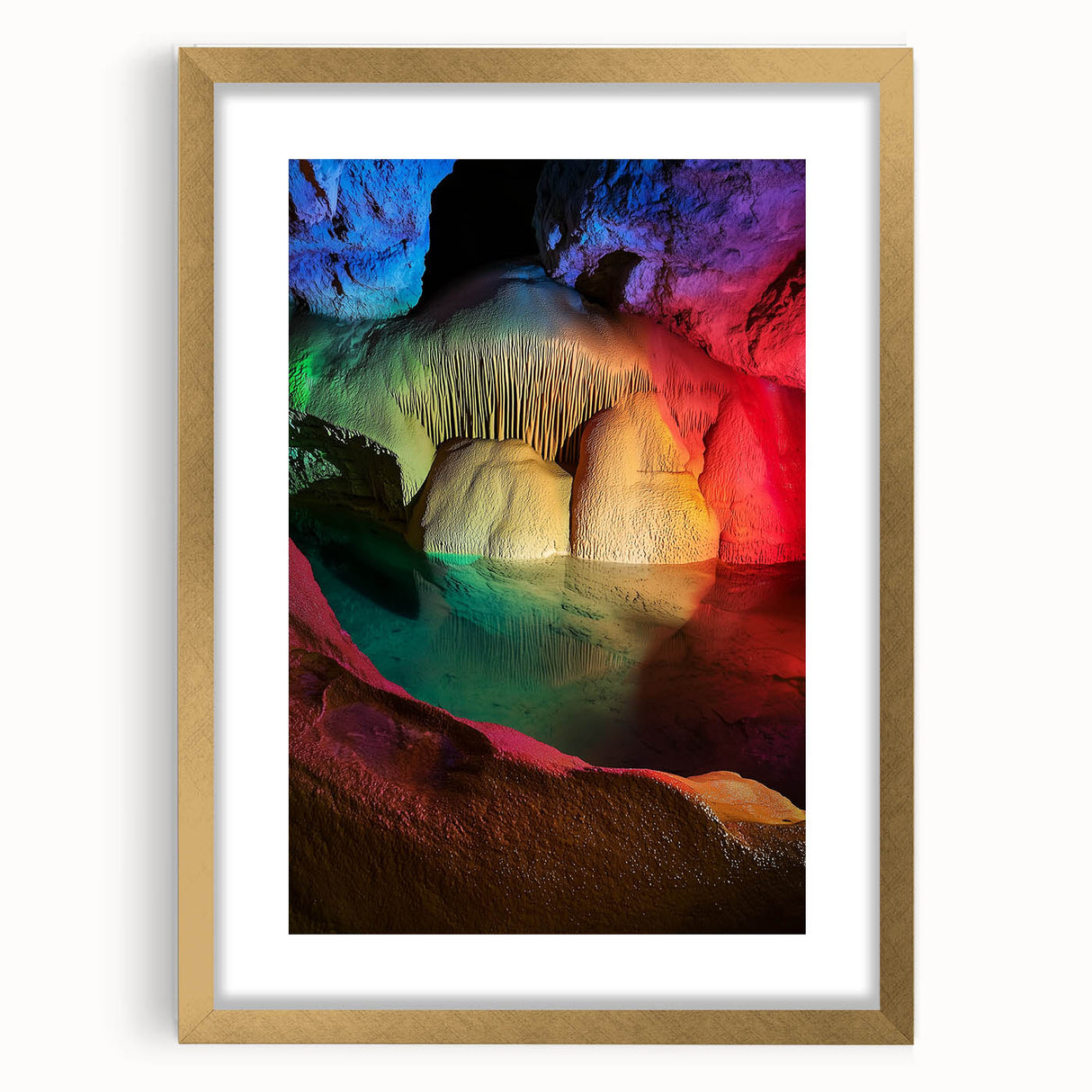 Elegant gold-framed landscape artwork featuring intricate cave designs, set against a neutral mat background, ideal for enhancing home decor aesthetics.