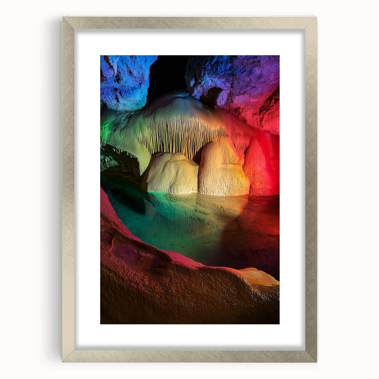 Silver-framed landscape artwork featuring intricate cave designs, elegantly matted for a polished presentation, ideal for modern home decor. The sleek silver frame enhances the natural colors of the artwork, making it a stunning focal point for any living space.