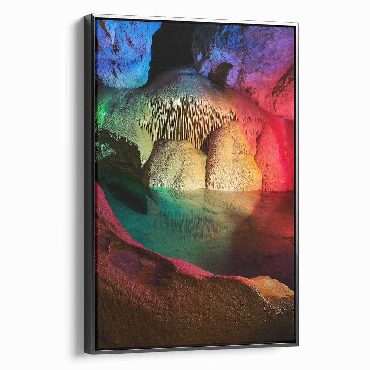 Framed canvas artwork depicting a serene landscape with caves, featuring a sleek black frame. Ideal for enhancing modern home decor and adding depth to interior spaces.