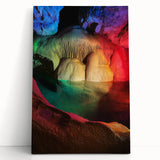 Vibrant stretched canvas artwork depicting a serene landscape with caves, featuring rich earth tones and intricate details, perfect for home decor enhancement.