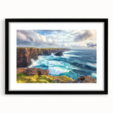 Black-framed landscape artwork showcasing dramatic cliffs and serene ocean views, elegantly matted for a refined presentation, perfect for home decor.