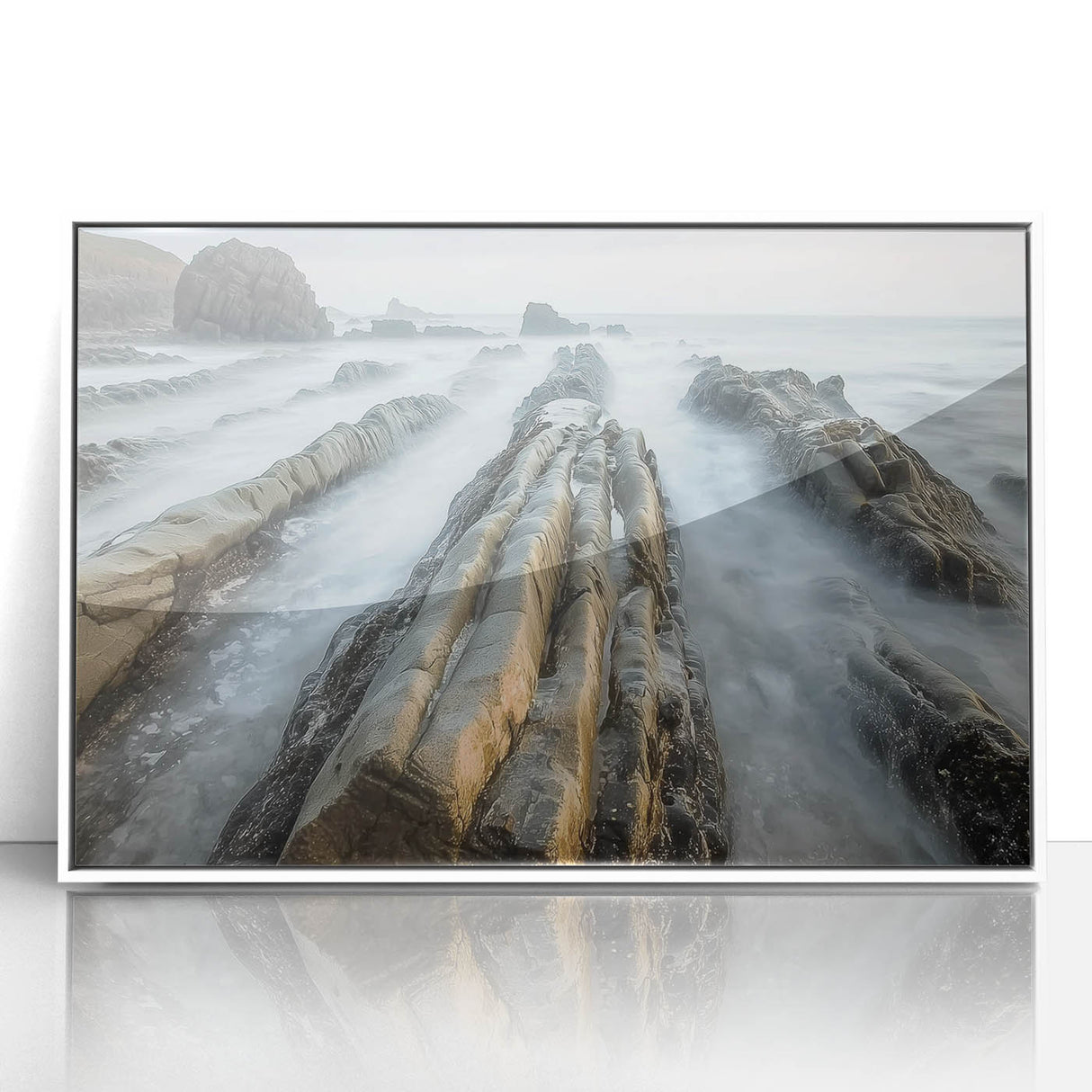 Framed acrylic artwork depicting a serene beach landscape with vibrant colors and gentle waves, elegantly mounted in a white frame for a calming decor touch.