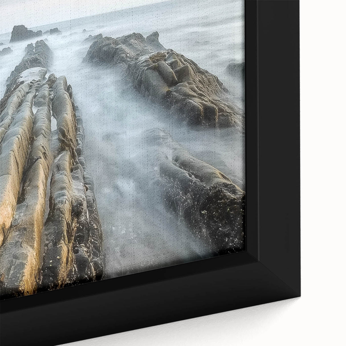 Close-up of a beautifully framed landscape canvas depicting serene beaches with vibrant colors and intricate details, perfect for beach-themed home decor.