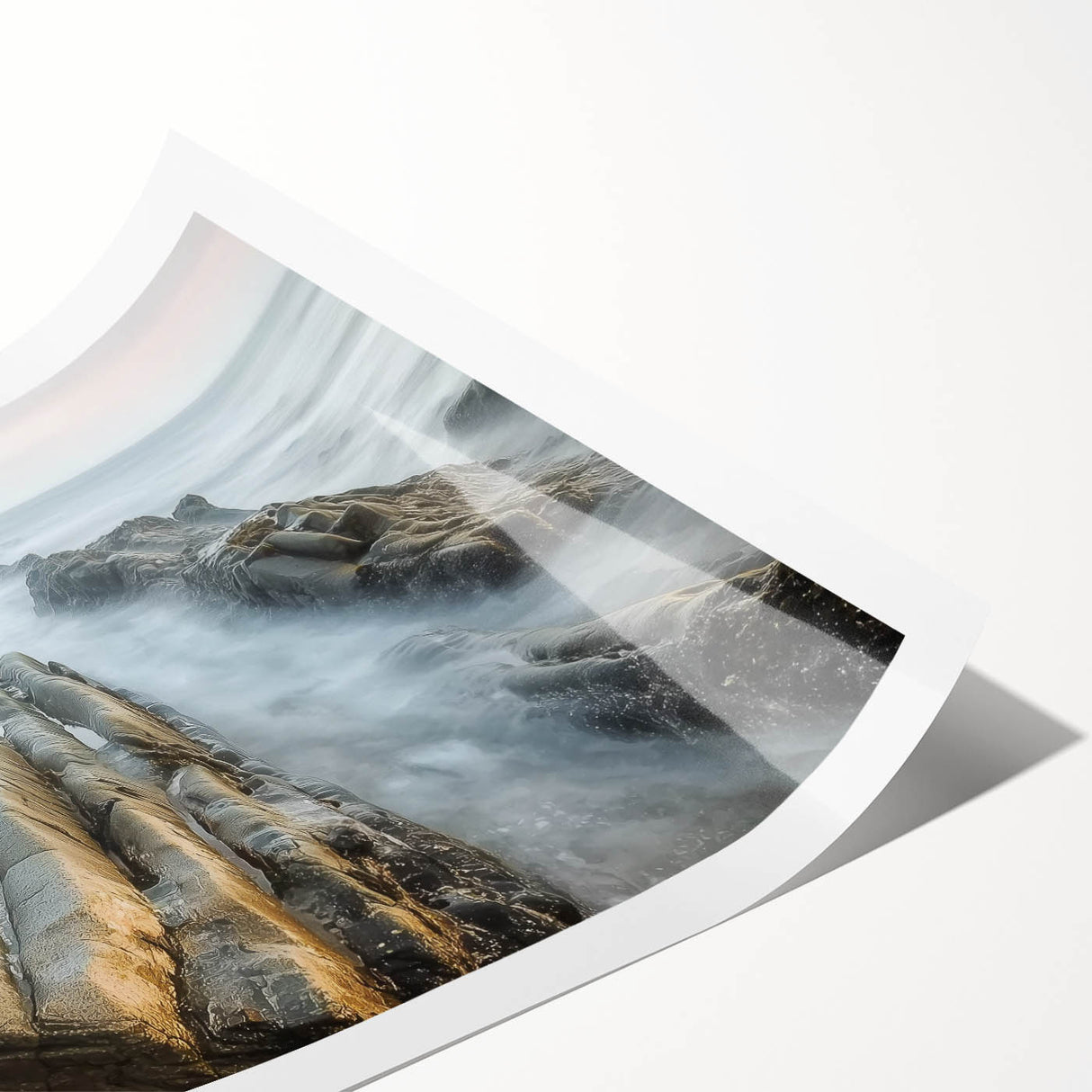 Vibrant landscape print showcasing a serene beach scene with soft waves and sandy shores, rolled neatly in a protective tube for easy display and shipping.