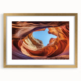 Elegant gold-framed landscape artwork of canyons, featuring a soft mat, perfect for home decor or office settings, showcasing rich earthy tones and intricate details.