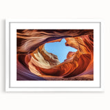 Landscape artwork depicting vibrant canyons framed in white with a mat, showcasing rich colors and intricate details, ideal for home decor or office spaces.