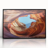 Framed acrylic artwork depicting a stunning landscape of canyons in vibrant colors, set against a sleek black frame, ideal for modern home decor.