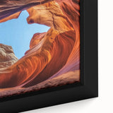 Close-up of a framed landscape canvas depicting vibrant canyons with rich earthy tones, showcasing intricate details and textures, ideal for enhancing home decor.