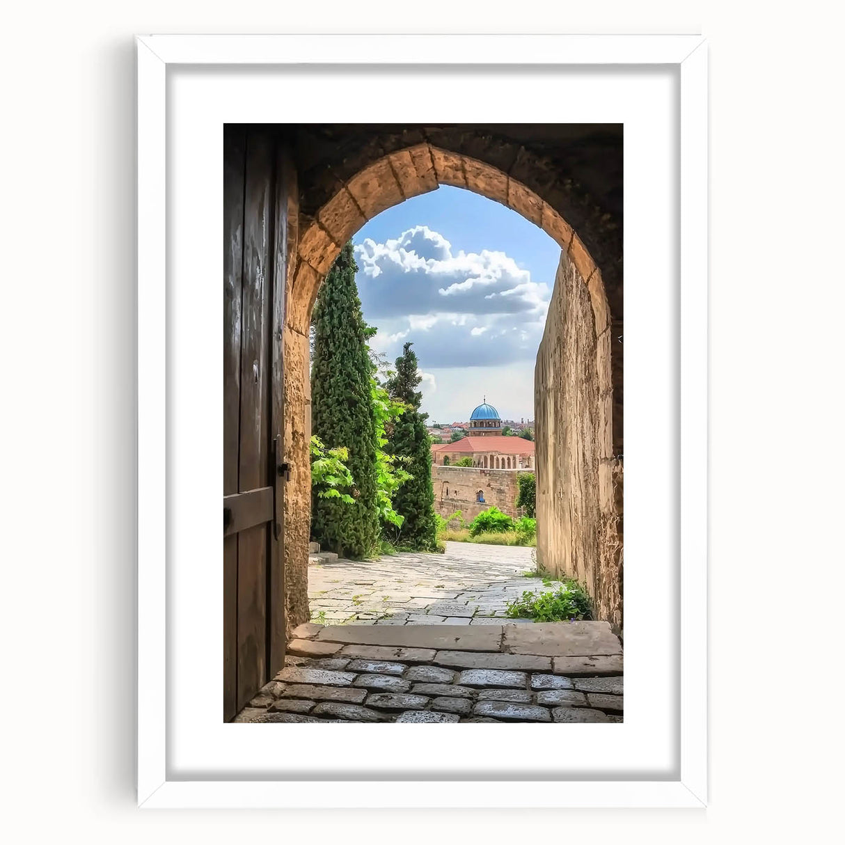 Elegant landscape artwork depicting a castle surrounded by lush greenery, framed with a white mat for a polished look, perfect for home decor.