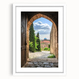 Elegant landscape artwork depicting a castle surrounded by lush greenery, framed with a white mat for a polished look, perfect for home decor.