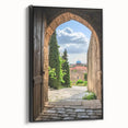 Framed canvas artwork depicting a serene landscape with a majestic castle, featuring a black frame and side view, ideal for enhancing home decor.