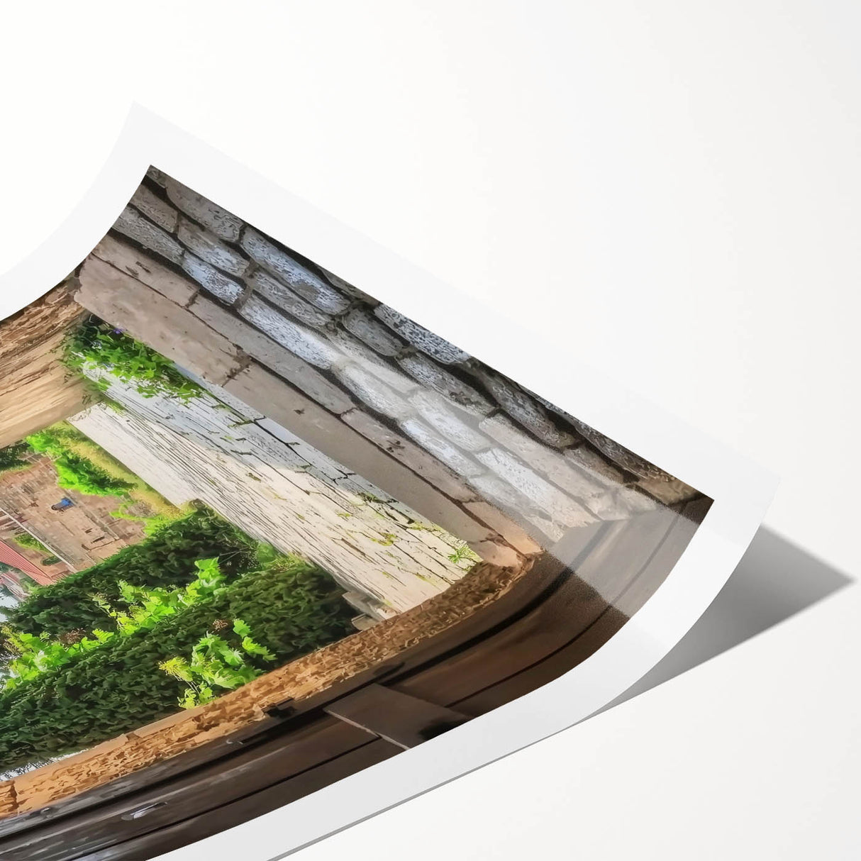 Stunning rolled landscape print showcasing a vibrant castle surrounded by lush greenery, ideal for home decor. Packaged securely in a protective cardboard tube.