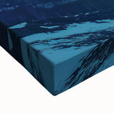 Close-up of a stretched canvas showcasing a vibrant landscape of majestic cliffs under a clear blue sky, perfect for home decor or art enthusiasts. The rich colors and detailed textures enhance visual appeal, making it an ideal centerpiece for any room.