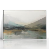 Framed abstract landscape wall art featuring soft, muted colors of blues and whites, set against a sleek acrylic background, perfect for modern home decor.