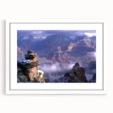 Framed landscape artwork depicting vibrant canyons with a white mat, showcasing rich colors and intricate details, perfect for home decor or office styling.