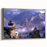 Framed canvas artwork showcasing a stunning landscape of canyons, highlighted by rich gold accents, perfect for enhancing modern home decor and interior aesthetics.