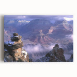 Stretched canvas artwork depicting a vibrant landscape of canyons, showcasing rich earth tones and intricate details, perfect for enhancing home decor.
