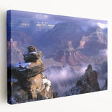 Stretched canvas artwork depicting a vibrant landscape of canyons, showcasing rich earth tones and dramatic rock formations, perfect for enhancing home decor.