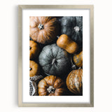 Textured abstract art print in warm autumn hues on a silver framed canvas, ideal for bedroom wall decor.