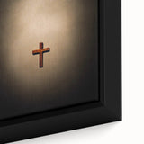 Close-up of a framed canvas featuring a textured, colorful abstract design on a black background.