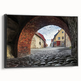 Framed canvas artwork showcasing a stunning landscape with a majestic castle set against a vibrant sky, presented in a sleek black frame, ideal for home decor.