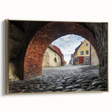 Framed canvas artwork depicting a majestic castle landscape, featuring intricate details and a gold frame that enhances its elegance, ideal for home decor.