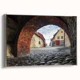 Framed canvas artwork depicting a serene landscape with a majestic castle, featuring a silver frame and showcasing intricate details and colors, perfect for home decor.