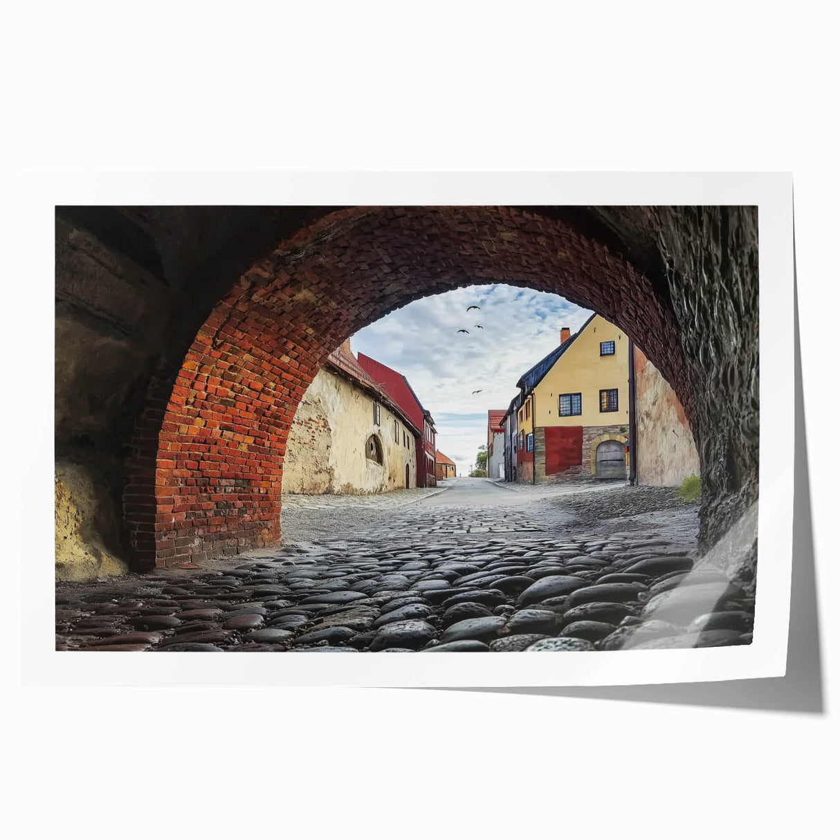 Scenic rolled print showcasing a beautiful landscape with a majestic castle surrounded by lush greenery, elegantly packaged in a protective cardboard tube for safe transport.