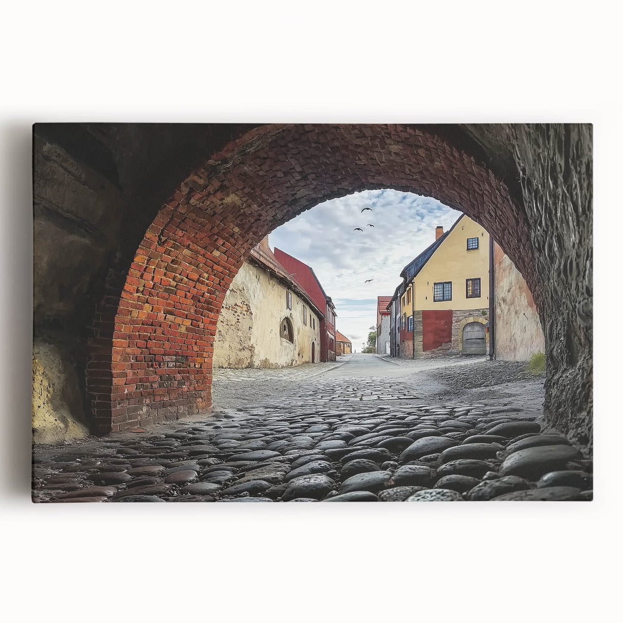 Stretched canvas artwork depicting a vibrant landscape featuring a majestic castle surrounded by lush greenery under a bright blue sky, perfect for home decor.