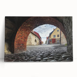 Stretched canvas artwork depicting a majestic landscape with a castle set against a vibrant sunset, showcasing rich colors and intricate details, ideal for enhancing home decor.