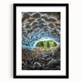 Framed black landscape artwork featuring intricate cave designs, presented in a sleek black frame with a mat, perfect for modern home decor and gallery displays.