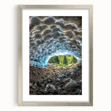 Framed landscape artwork depicting a serene cave scene, featuring a silver mat and elegant frame, perfect for enhancing home decor with natural beauty.