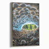 Framed canvas artwork showcasing a stunning landscape with intricate cave formations, presented in a sleek silver frame, ideal for modern home decor.