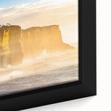 Close-up of a framed canvas artwork depicting a vibrant landscape with dramatic cliffs and serene skies, showcasing rich colors and detailed textures, perfect for home decor.