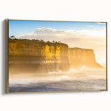 Framed canvas artwork showcasing a stunning cliff landscape with golden accents, perfect for home decor. Side view highlights the elegant frame and design.