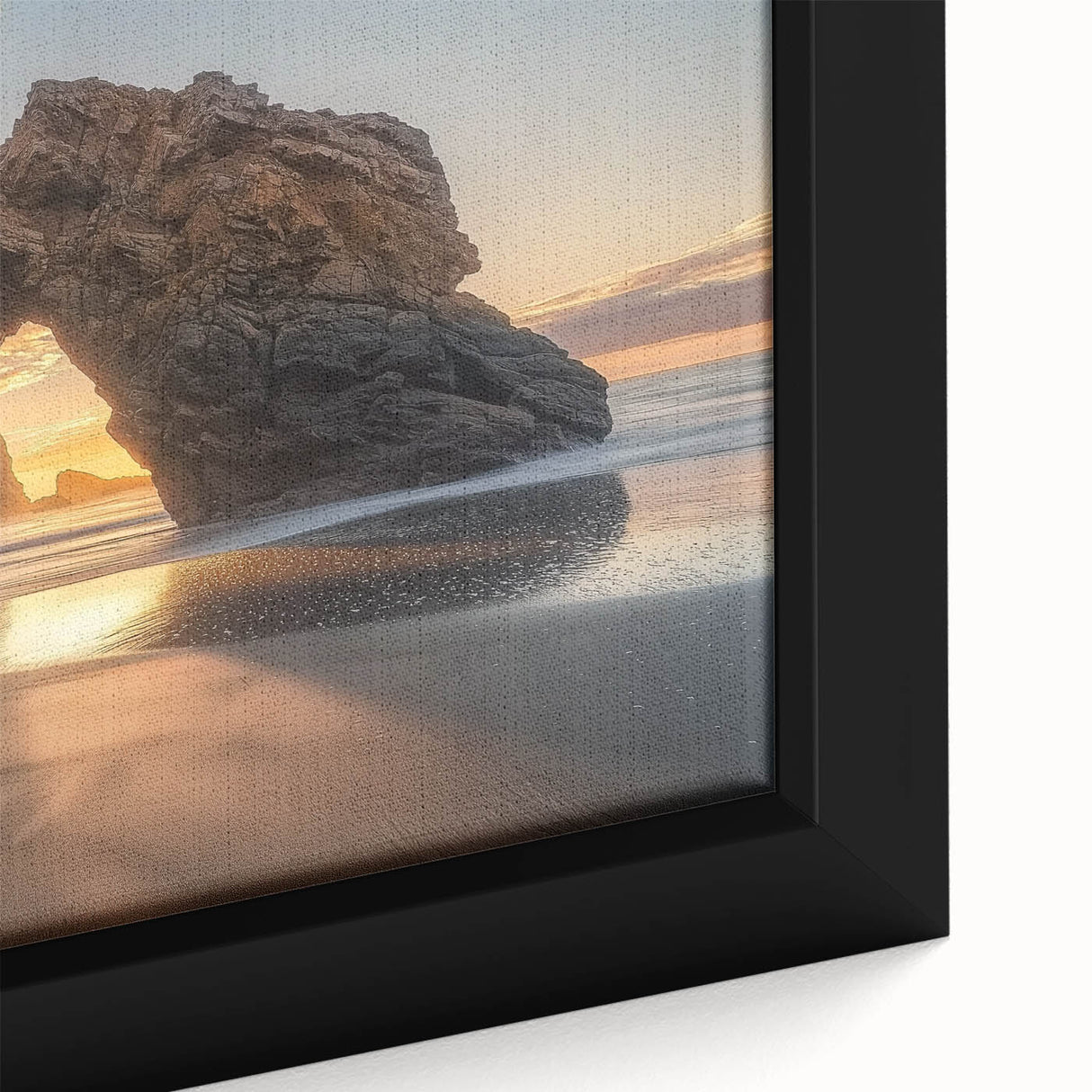 Close-up of a framed canvas depicting a serene beach landscape, showcasing vibrant colors and fine details of sand and waves, perfect for coastal decor.