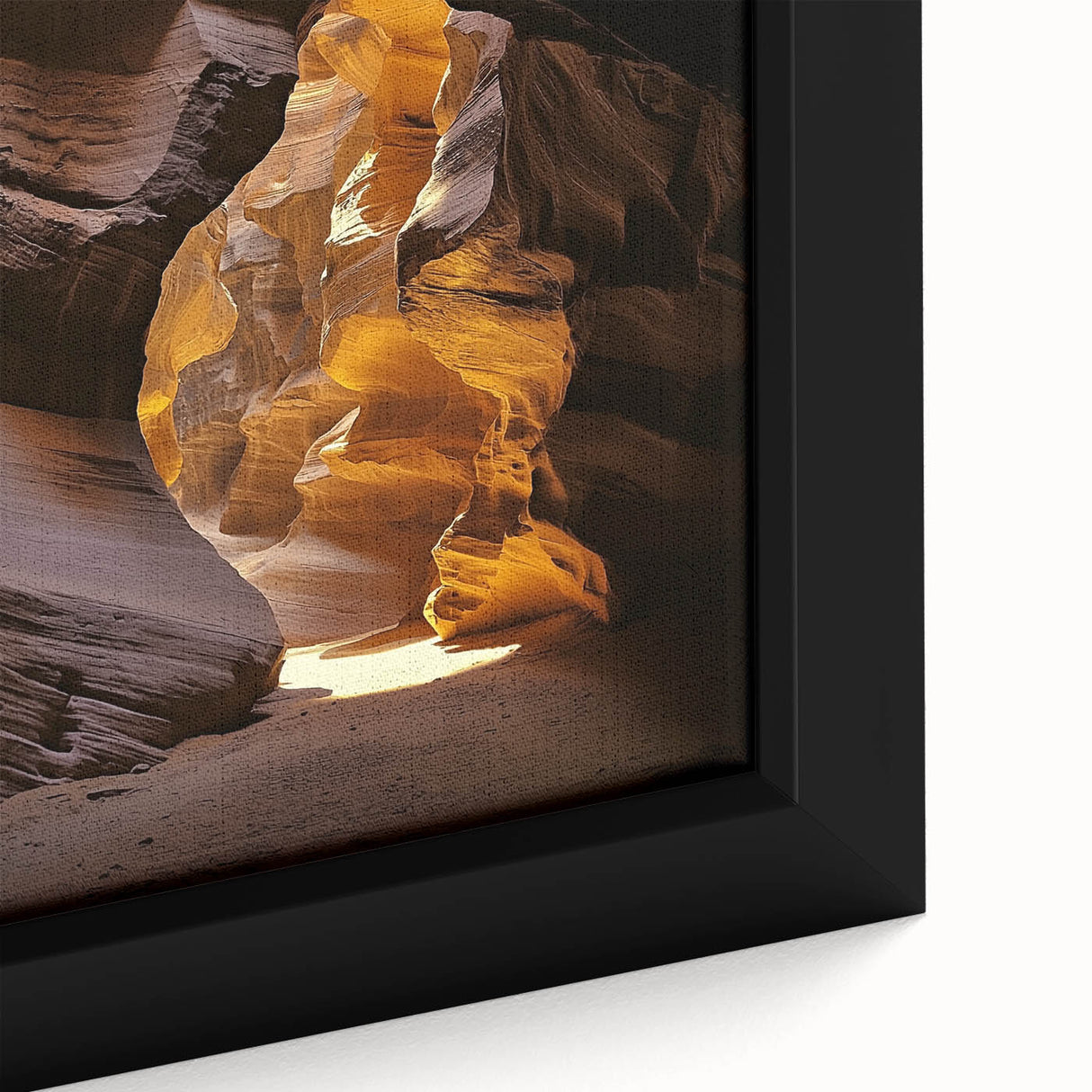 Close-up of a framed canvas artwork depicting a stunning landscape with intricate cave formations and vibrant colors, ideal for home decor and art enthusiasts.