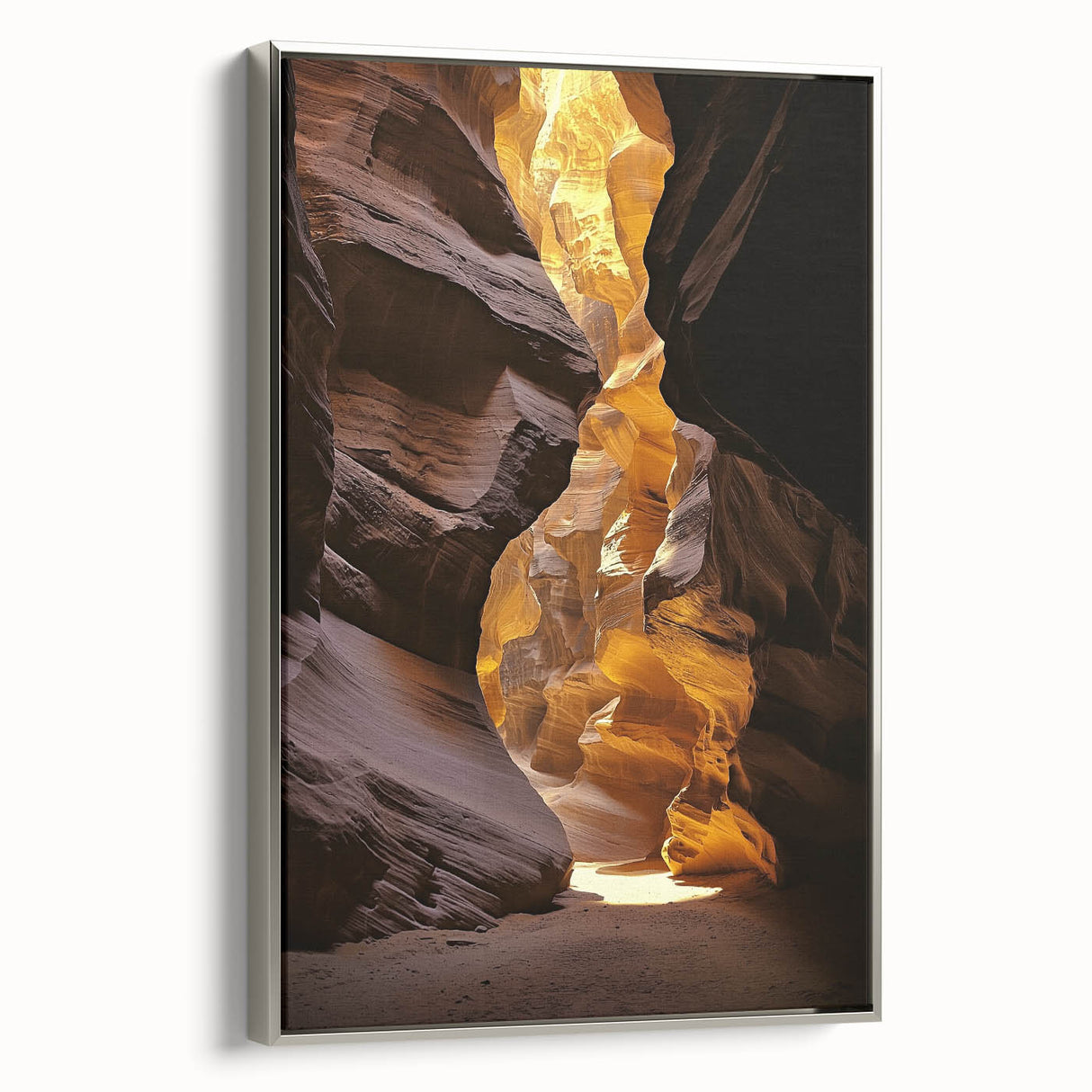 Framed canvas artwork showcasing a scenic landscape with caves, featuring a silver side profile. Ideal for modern home decor, adding elegance and depth to any space.
