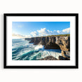 Framed landscape artwork depicting dramatic cliffs with a black mat border, ideal for home decor, showcasing nature's beauty in a stylish presentation.